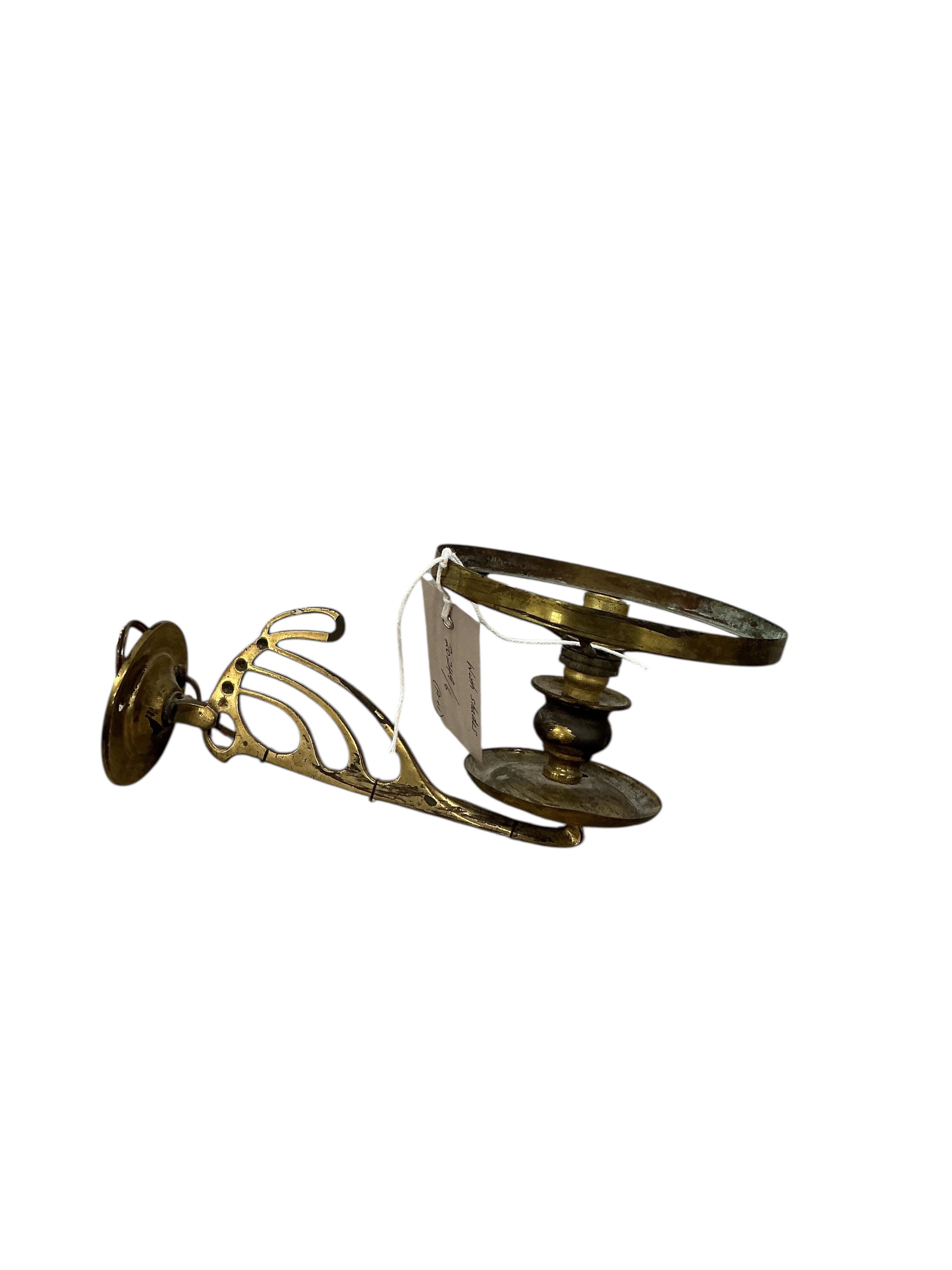 A pair of late Victorian brass wall fitting gas lamps with odd shades (converted), and another electric wall light